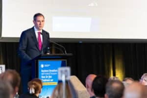 Federal Treasurer Dr Jim Chalmers speaking at a business breakfast