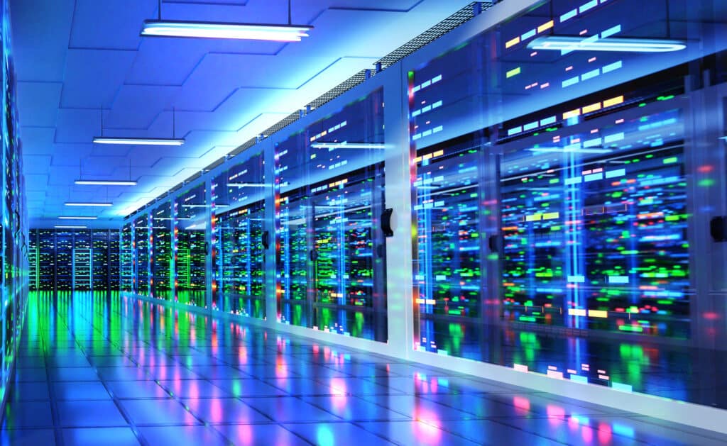 A long row of servers lined up in a data centre, showcasing advanced technology and organised infrastructure.