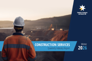 Report cover of a construction worker overlooking a mine site