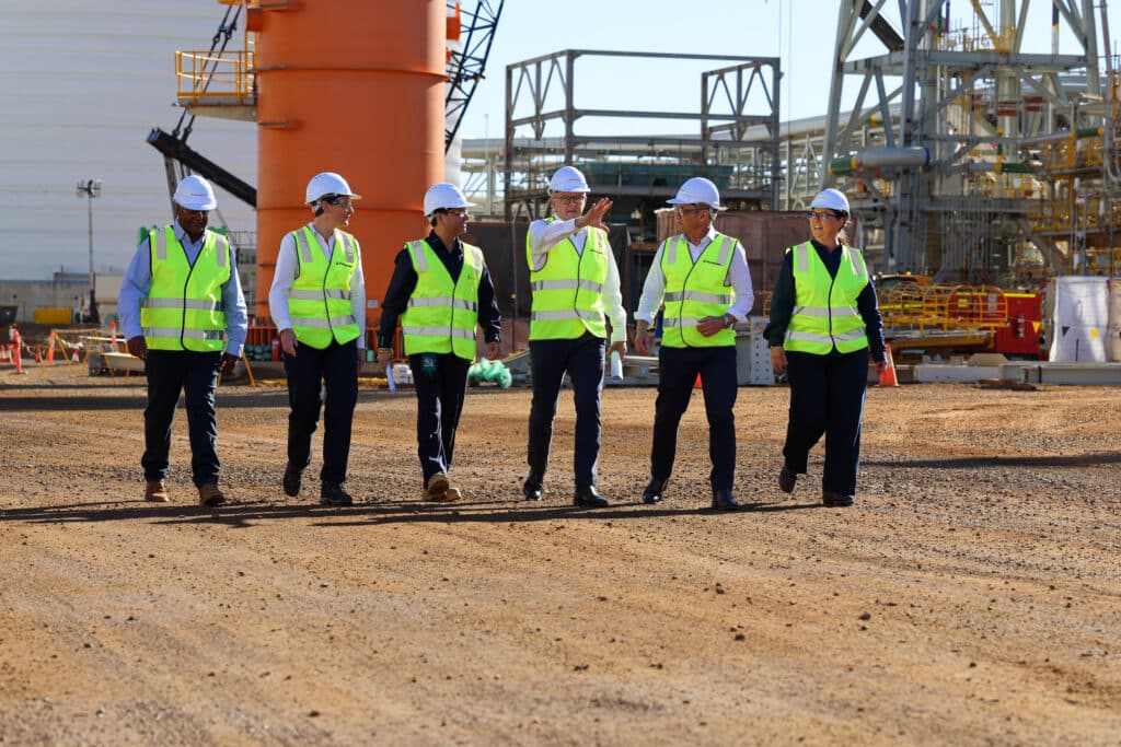 Prime Minister Anthony Albanese WA Premier Roger Cook with Perdaman Chairman Vikas Rambal, Director Maegha Rambal, Minister for Resources Madeleine King MP, WA Minister for Energy and Decarbonisation Amber-Jade Sanderson MLA, and Member for Pilbara Kevin Michel MLA walk though Project Ceres in the Pilbara